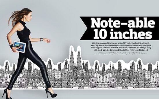 Female model in black holding tablet photoshoot