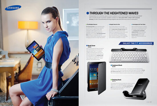 Female model holding tablet product photoshoot