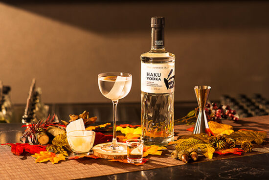 Haku Vodka bottle in bar scene – beverage photography.