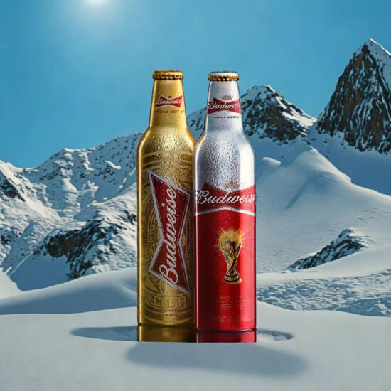 Budweiser Beer bottles on snow mountain background – creative beverage photography.