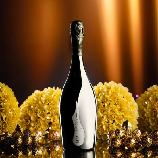 Bottega Gold Elegant champagne bottle with yellow flowers – luxury beverage photography.