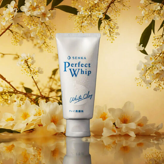 Senka Skincare cream tube with yellow floral background – product shoot.