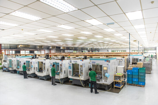 Modern factory interior with CNC machinery