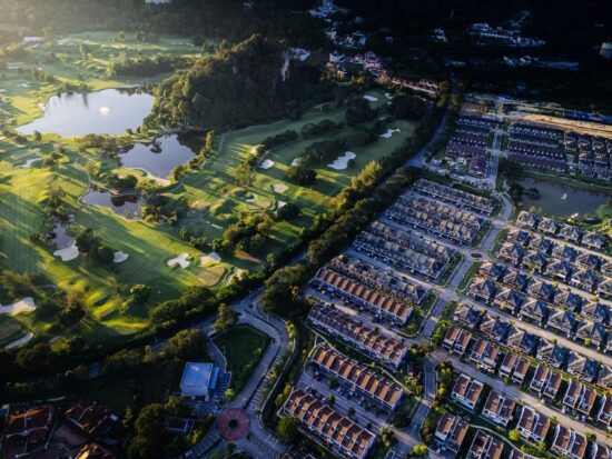 Golden Hours view with golf club house and town house